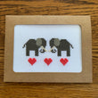 Elephant greeting card with hearts